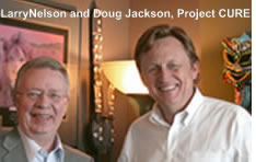 Larry Nelson with Doug Jackson at Project C.U.R.E. headquarters in Denver, Colorado